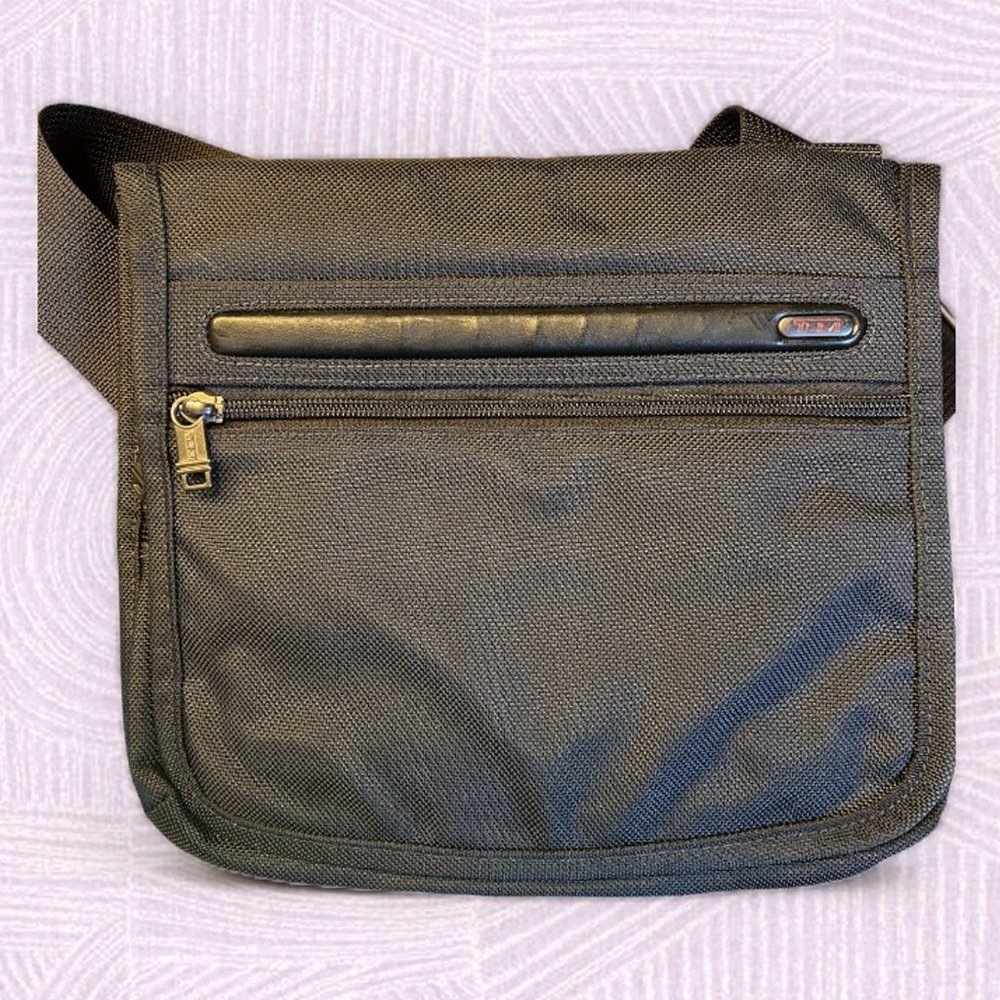 New - TUMI black crossbody slim bag - NWOT